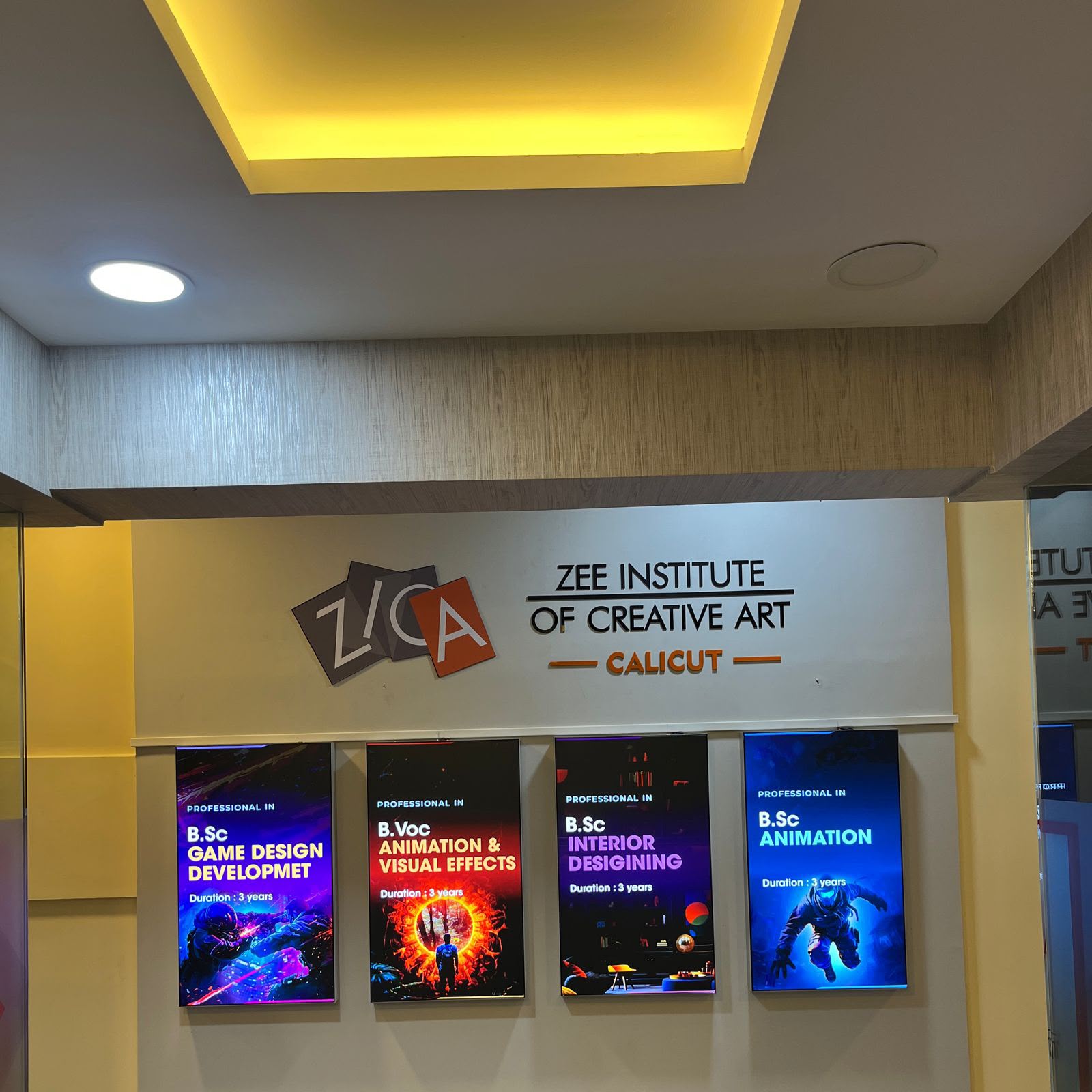 ZICA Calicut interior branding and wall displays